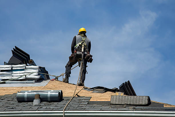 Professional Roofing technician working in Belmont, MI